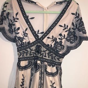 Women’s  nude and black romper